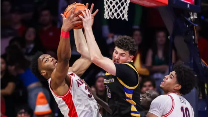 Tobe Awaka battles for a rebound with an Embry-Riddle defender Tobe Awaka battles for a rebound with an Embry-Riddle defender