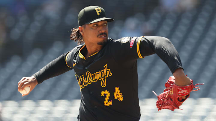 Sep 17, 2025; Pittsburgh, Pennsylvania, USA;  Pittsburgh Pirates starting pitcher Johan Oviedo (24) delivers a pitch against the Chicago Cubs during the first inning at PNC Park. Mandatory Credit: Charles LeClaire-Imagn Images