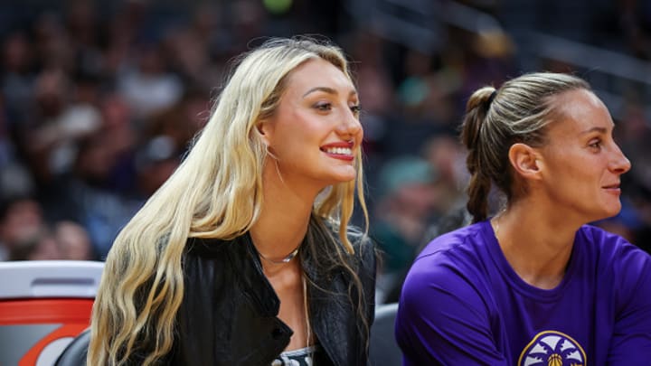 LOS ANGELES, CALIFORNIA - JULY 09: Cameron Brink #22 of the Los Angeles Sparks looks on from the bench during the second half of the game against the Minnesota Lynx at Crypto.com Arena on July 09, 2024 in Los Angeles, California.