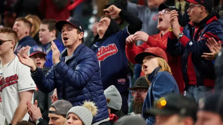 Cleveland Guardians fans cheering at Progressive Field.