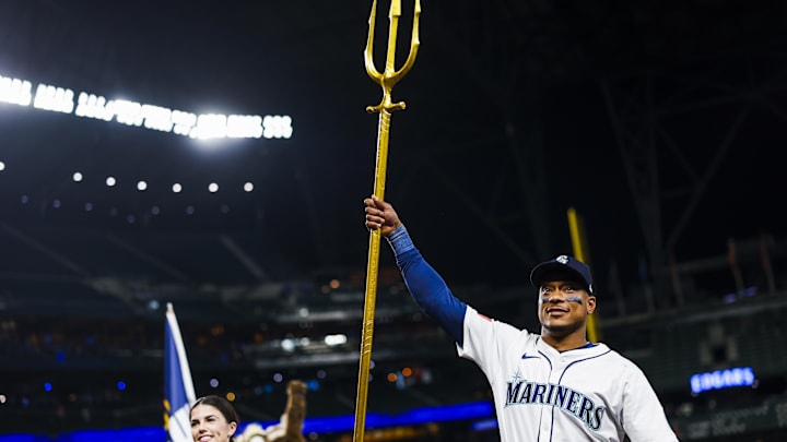 Seattle Mariners designated hitter Jorge Polanco (7) raises the trident following a 5-3 victory against the Los Angeles Angels at T-Mobile Park on April 29.