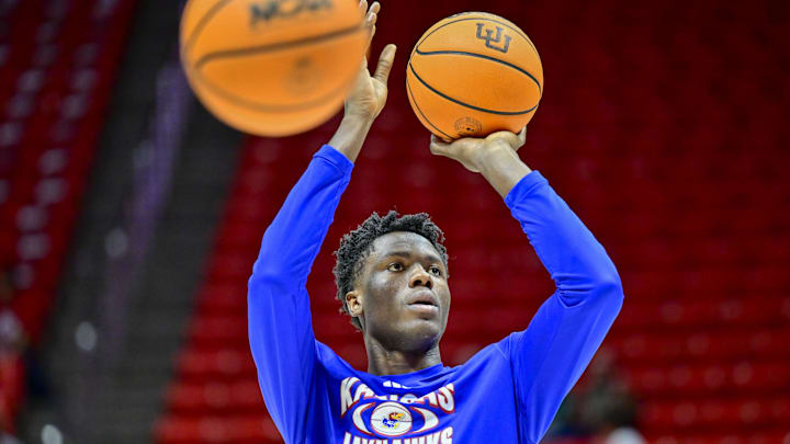 Feb 15, 2025; Salt Lake City, Utah, USA; Kansas Jayhawks forward Flory Bidunga (40) warms up before the game against the Utah Utes at the Jon M. Huntsman Center. Mandatory Credit: Christopher Creveling-Imagn Images