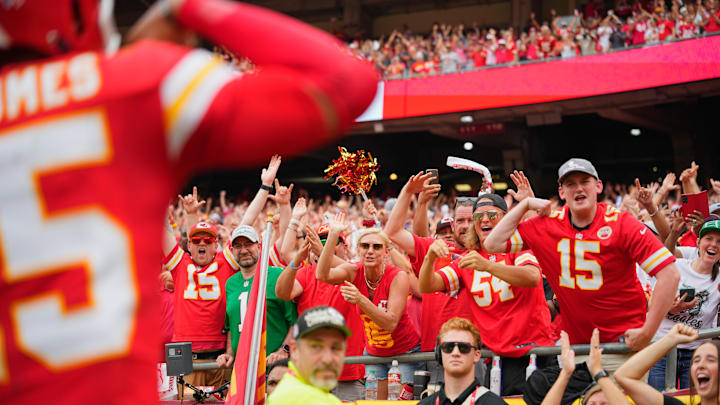 Sep 14, 2025; Kansas City, Missouri, USA; Kansas City Chiefs fans celebrate after a touchdown by Kansas City Chiefs quarterback Patrick Mahomes (15) against the Philadelphia Eagles during the second quarter of the game at GEHA Field at Arrowhead Stadium. Mandatory Credit: Jay Biggerstaff-Imagn Images