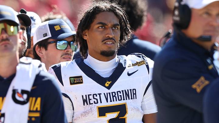Oct 3, 2026; Ames, Iowa, USA; West Virginia Mountaineers quarterback Michael Hawkins Jr. (3) watches his team play the Iowa State Cyclones during the second half at Jack Trice Stadium. Mandatory Credit: Reese Strickland-Imagn Images Oct 3, 2026; Ames, Iowa, USA; West Virginia Mountaineers quarterback Michael Hawkins Jr. (3) watches his team play the Iowa State Cyclones during the second half at Jack Trice Stadium. Mandatory Credit: Reese Strickland-Imagn Images