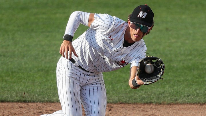 Muskego High School's Cooper Wendt (4) fields a ground ball during the WIAA Division 1 state championship baseball game on June 19, 2025.