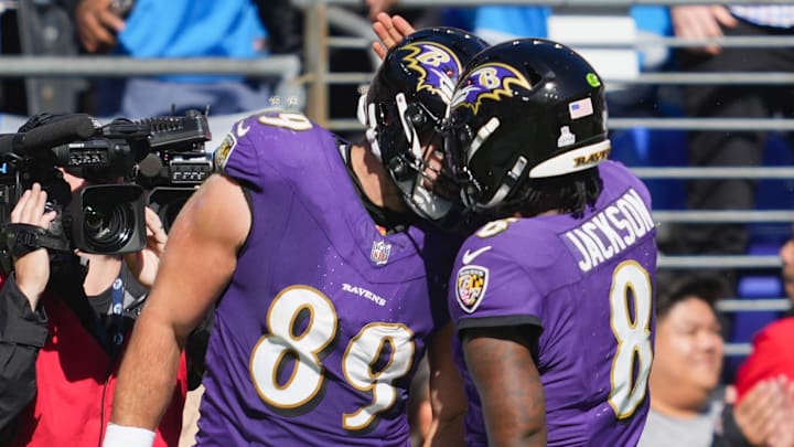 Oct 22, 2023; Baltimore, Maryland, USA; Baltimore Ravens  tight end Mark Andrews (89) celebrates with quarterback Lamar Jackson (8) following his touchdown against the Detroit Lions during the second quarter at M&T Bank Stadium. Mandatory Credit: Mitch Stringer-Imagn Images