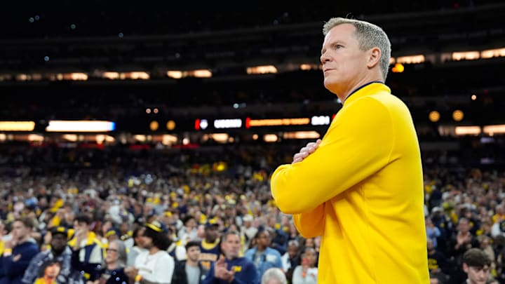 Michigan head coach Dusty May looks on from the court ahead of the NCAA national championship game against Connecticut at Lucas Oil Stadium in Indianapolis on Monday, April 6, 2026.