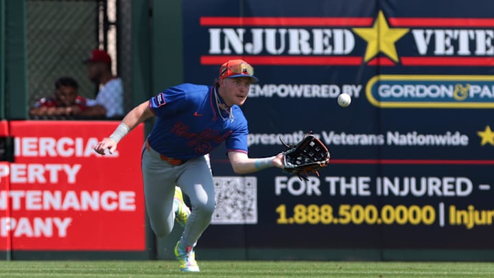 Feb 27, 2026; Jupiter, Florida, USA; New York Mets right fielder Carson Benge (93) makes a diving catch to retire St. Louis Cardinals left fielder Nelson Velázquez (not pictured) during the second inning at Roger Dean Chevrolet Stadium. Mandatory Credit: Sam Navarro-Imagn Images