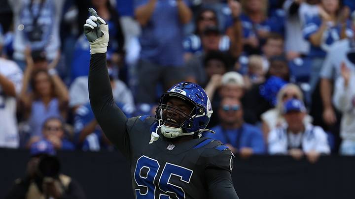 Indianapolis Colts defensive tackle Adetomiwa Adebawore (95) reacts after a play
