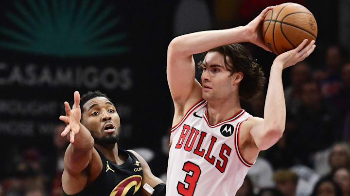 Nov 15, 2024; Cleveland, Ohio, USA; Cleveland Cavaliers guard Donovan Mitchell (45) defends Chicago Bulls guard Josh Giddey (3) during the first quarter at Rocket Mortgage FieldHouse. Mandatory Credit: Ken Blaze-Imagn Images