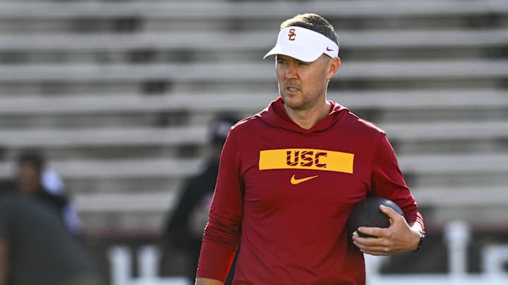 Oct 19, 2024; College Park, Maryland, USA; Southern California Trojans head coach Lincoln Riley stands on the field before the game against the Maryland Terrapins at SECU Stadium. Mandatory Credit: Tommy Gilligan-Imagn Images Oct 19, 2024; College Park, Maryland, USA; Southern California Trojans head coach Lincoln Riley stands on the field before the game against the Maryland Terrapins at SECU Stadium. Mandatory Credit: Tommy Gilligan-Imagn Images
