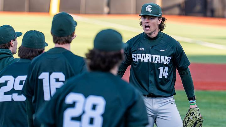 Michigan State pitcher Tommy Szczepanski (14) celebrates after the final out at Jim Patterson Stadium as the Louisville Cardinals baseball fell 4–3 to the Michigan State Spartans baseball in the season opener in Louisville, Ky., on Friday, Feb. 13, 2026.