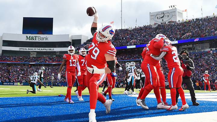 Dec 19, 2021; Orchard Park, New York, USA; Buffalo Bills offensive tackle Spencer Brown (79) spikes the ball following a touchdown by running back Devin Singletary (26) vs. the Carolina Panthers during the first half of an NFL game at Highmark Stadium. Dec 19, 2021; Orchard Park, New York, USA; Buffalo Bills offensive tackle Spencer Brown (79) spikes the ball following a touchdown by running back Devin Singletary (26) vs. the Carolina Panthers during the first half of an NFL game at Highmark Stadium.