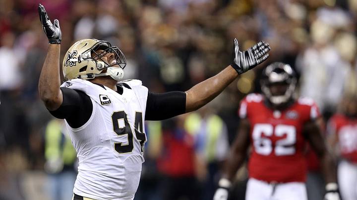 Oct 15, 2015; New Orleans, LA, USA; New Orleans Saints defensive end Cameron Jordan (94) celebrates a defensive play against the Atlanta Falcons in the second half of their game at the Mercedes-Benz Superdome. Mandatory Credit: Chuck Cook-Imagn Images