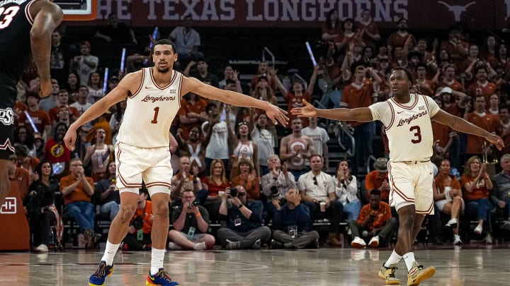Texas longhorns forward Dylan Disu (1) and guard Max Abmas (3) celebrate a score during the basketball game against Oklahoma State at the Moody Center on Saturday, Mar. 2, 2024 in Austin. Texas longhorns forward Dylan Disu (1) and guard Max Abmas (3) celebrate a score during the basketball game against Oklahoma State at the Moody Center on Saturday, Mar. 2, 2024 in Austin.