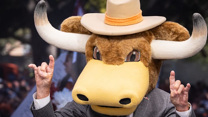 Lee Corso wears the head of Texas Longhorns' mascot Hookn'Em after picking Texas to win during ESPN's College Game Day,