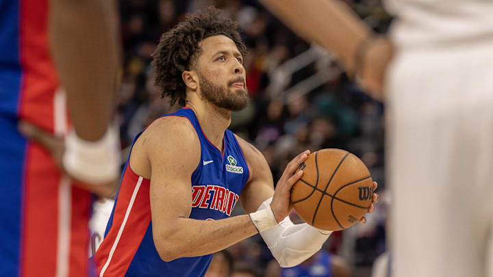 Feb 5, 2025; Detroit, Michigan, USA; Detroit Pistons guard Cade Cunningham (2) shoots a free throw against the Cleveland Cavaliers during the first half at Little Caesars Arena. Mandatory Credit: David Reginek-Imagn Images