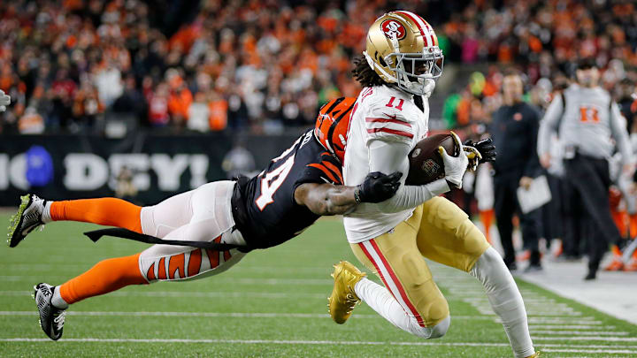 Cincinnati Bengals safety Vonn Bell (24) dives for San Francisco 49ers wide receiver Brandon Aiyuk (11) as he runs in a catch for the game-winning touchdown in overtime of the NFL Week 14 game between the Cincinnati Bengals and the San Francisco 49ers at Paul Brown Stadium in downtown Cincinnati on Sunday, Dec. 12, 2021. The Bengals tied the game in the fourth quarter, but eventually fell to the 49ers in overtime, 26-23.
San Francisco 49ers At Cincinnati Bengals Cincinnati Bengals safety Vonn Bell (24) dives for San Francisco 49ers wide receiver Brandon Aiyuk (11) as he runs in a catch for the game-winning touchdown in overtime of the NFL Week 14 game between the Cincinnati Bengals and the San Francisco 49ers at Paul Brown Stadium in downtown Cincinnati on Sunday, Dec. 12, 2021. The Bengals tied the game in the fourth quarter, but eventually fell to the 49ers in overtime, 26-23.
San Francisco 49ers At Cincinnati Bengals