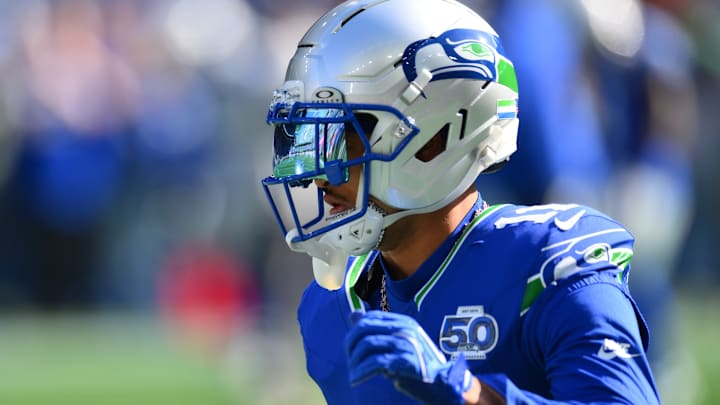 Oct 5, 2025; Seattle, Washington, USA; Seattle Seahawks wide receiver Jaxon Smith-Njigba (11) wearing the Seahawks throw back helmet prior to a game against the Tampa Bay Buccaneers at Lumen Field. Oct 5, 2025; Seattle, Washington, USA; Seattle Seahawks wide receiver Jaxon Smith-Njigba (11) wearing the Seahawks throw back helmet prior to a game against the Tampa Bay Buccaneers at Lumen Field.