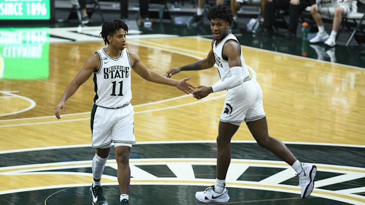 Jan 8, 2021; East Lansing, Michigan, USA; Michigan State Spartans guard A.J. Hoggard (11) high fives