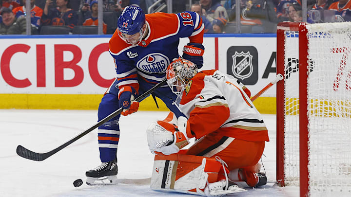 Mar 28, 2026; Edmonton, Alberta, CAN; Edmonton Oilers forward Zach Hyman (18) tries to get to a loose puck in front of Anaheim Ducks goaltender Lucas Dostal (1) during the first period at Rogers Place. Mandatory Credit: Perry Nelson-Imagn Images Mar 28, 2026; Edmonton, Alberta, CAN; Edmonton Oilers forward Zach Hyman (18) tries to get to a loose puck in front of Anaheim Ducks goaltender Lucas Dostal (1) during the first period at Rogers Place. Mandatory Credit: Perry Nelson-Imagn Images