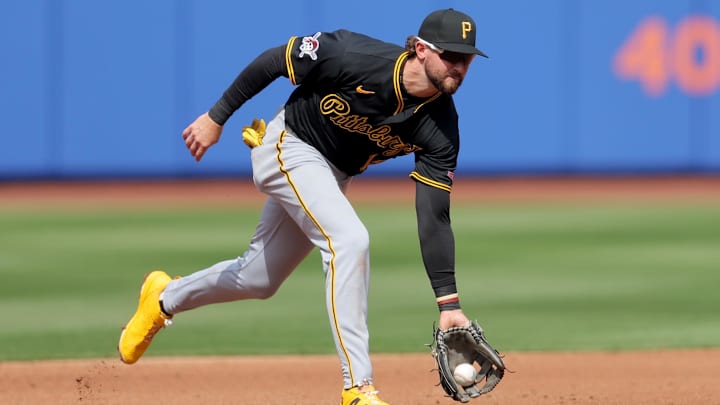 Mar 26, 2026; New York City, New York, USA; Pittsburgh Pirates shortstop Jared Triolo (19) fields a ground ball by New York Mets center fielder Luis Robert Jr. (not pictured) during the second inning at Citi Field. Mandatory Credit: Brad Penner-Imagn Images