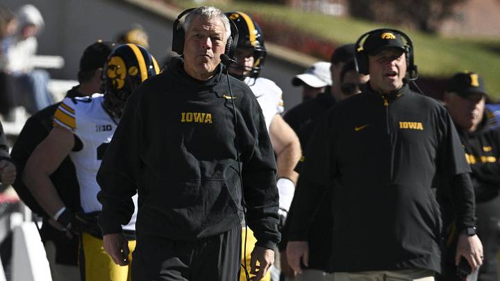 Nov 23, 2024; College Park, Maryland, USA;  Iowa Hawkeyes head coach Kirk Ferentz looks onto the field during the first half against the Maryland Terrapins at SECU Stadium. Mandatory Credit: Tommy Gilligan-Imagn Images
