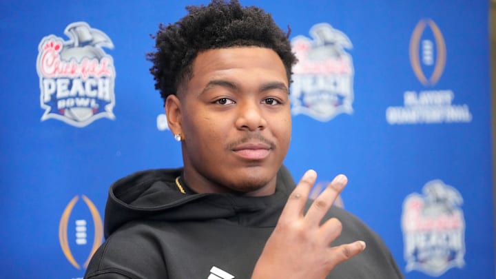 Arizona State defensive lineman C.J. Fite gives the forks up sign during media day for the Chick-fil-A Peach Bowl in Atlanta on Monday, Dec. 30, 2024. Arizona State defensive lineman C.J. Fite gives the forks up sign during media day for the Chick-fil-A Peach Bowl in Atlanta on Monday, Dec. 30, 2024.