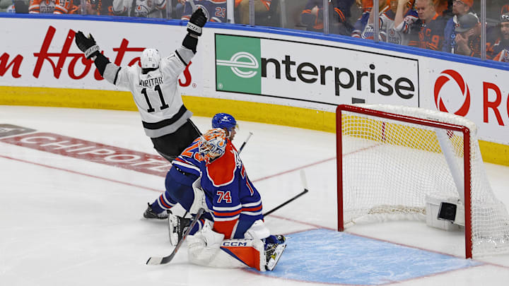 Apr 24, 2024; Edmonton, Alberta, CAN; Los Angeles Kings forward Anze Kopitar (11) scores the game