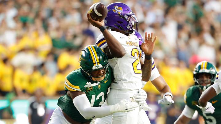 Sep 12, 2026; Waco, Texas, USA; Prairie View A&M Panthers quarterback Tevin Carter (21) is sacked by Baylor Bears linebacker Garrick Ponder (13) during the first half at McLane Stadium. Mandatory Credit: Chris Jones-Imagn Images Sep 12, 2026; Waco, Texas, USA; Prairie View A&M Panthers quarterback Tevin Carter (21) is sacked by Baylor Bears linebacker Garrick Ponder (13) during the first half at McLane Stadium. Mandatory Credit: Chris Jones-Imagn Images