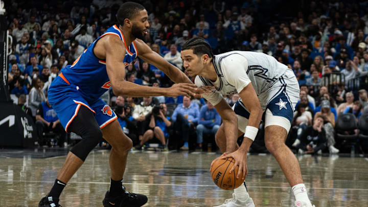 Orlando Magic guard Anthony Black (0) dribbles the ball against New York Knicks guard Mikal Bridges (25) in the fourth quarter at Kia Center.