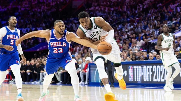 Oct 23, 2024; Philadelphia, Pennsylvania, USA; Philadelphia 76ers guard Eric Gordon (23) knocks the ball away from Milwaukee Bucks forward Giannis Antetokounmpo (34) during the first quarter at Wells Fargo Center. Mandatory Credit: Bill Streicher-Imagn Images