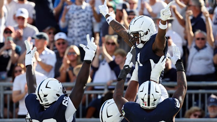 Penn State Nittany Lions wide receiver Kyron Hudson (1) celebrates with teammates after scoring a touchdown during the second quarter against the Nevada Wolf Pack at Beaver Stadium. 