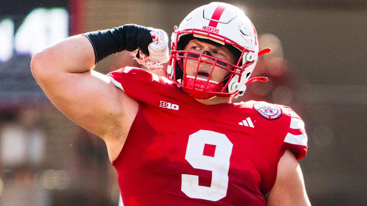 Former Nebraska Cornhuskers defensive lineman Ty Robinson (9) celebrates after a sack against the Rutgers Scarlet Knights.