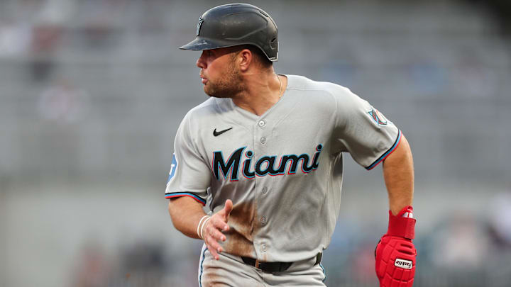 Miami Marlins center fielder Jakob Marsee (87) runs to third base against the Atlanta Braves. 