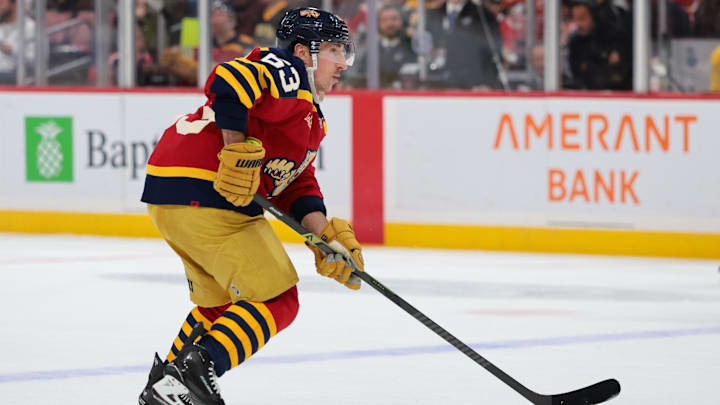 Feb 4, 2026; Sunrise, Florida, USA; Florida Panthers left wing Brad Marchand (63) moves the puck against the Boston Bruins during the first period at Amerant Bank Arena. Mandatory Credit: Sam Navarro-Imagn Images