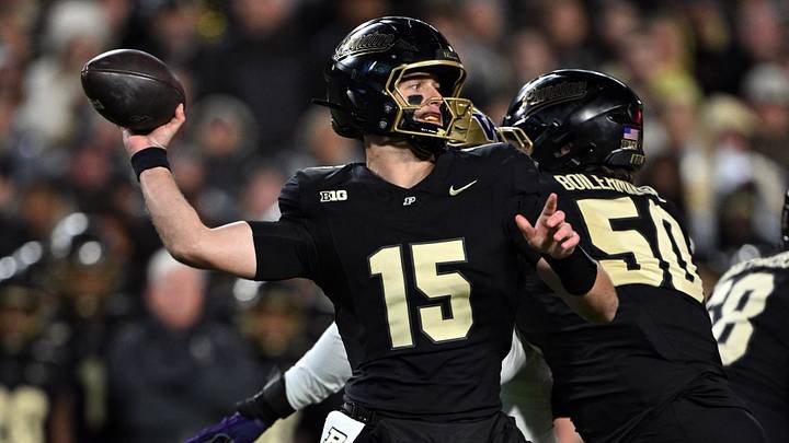 Purdue Boilermakers quarterback Ryan Browne (15) throws a pass.
