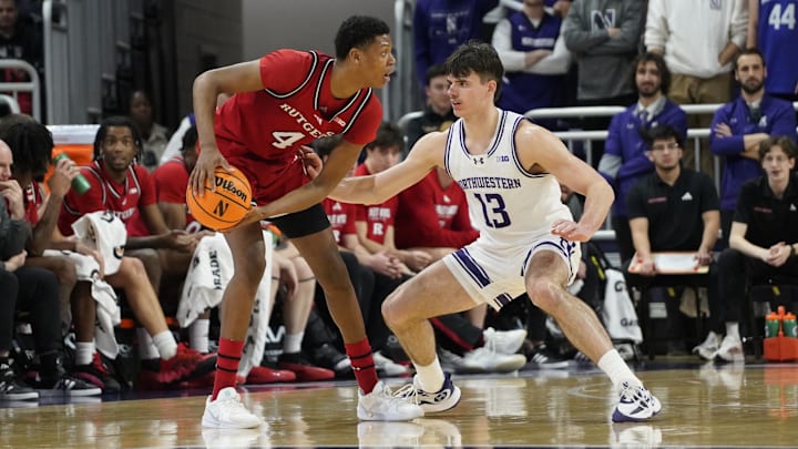 Jan 29, 2025; Evanston, Illinois, USA;Northwestern Wildcats guard Brooks Barnhizer (13) defends Rutgers Scarlet Knights guard Ace Bailey (4) during the second half at Welsh-Ryan Arena.