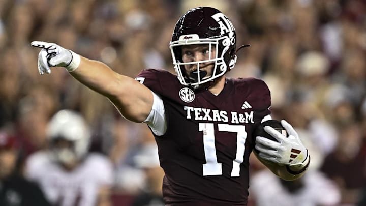 Nov 16, 2024; College Station, Texas, USA; Texas A&M Aggies tight end Theo Melin Ohrstrom (17) motions during the first quarter against the New Mexico State Aggies at Kyle Field. Mandatory Credit: Maria Lysaker-Imagn Images 