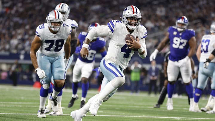 Nov 12, 2023; Arlington, Texas, USA; Dallas Cowboys quarterback Dak Prescott (4) runs for a