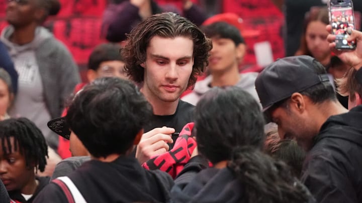 Apr 16, 2025; Chicago, Illinois, USA; Chicago Bulls guard Josh Giddey (3) signs autographs before the game against the Miami Heat at United Center. Mandatory Credit: David Banks-Imagn Images