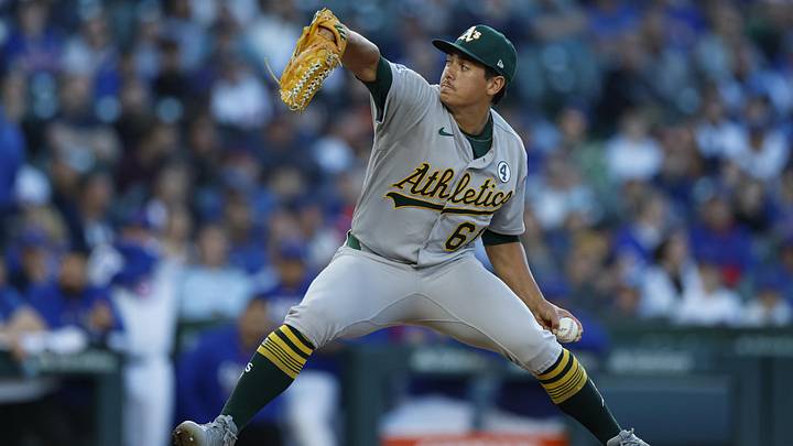 Jun 2, 2026; Chicago, Illinois, USA; Athletics starting pitcher Gage Jump (61) delivers a pitch against the Chicago Cubs during the first inning at Wrigley Field. Mandatory Credit: Kamil Krzaczynski-Imagn Images