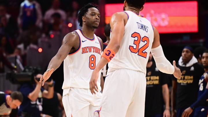 May 25, 2026; Cleveland, Ohio, USA; New York Knicks forward OG Anunoby (8) high fives New York Knicks center Karl-Anthony Towns (32) in the fourth quarter against the Cleveland Cavaliers during game four of the eastern conference finals for the 2026 NBA playoffs at Rocket Arena. Mandatory Credit: Ken Blaze-Imagn Images
