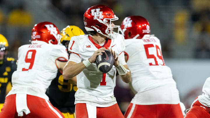 Oct 25, 2025; Tempe, Arizona, USA; Houston Cougars quarterback Conner Weigman (1) against the Arizona State Sun Devils in the second half at Mountain America Stadium. Mandatory Credit: Mark J. Rebilas-Imagn Images Oct 25, 2025; Tempe, Arizona, USA; Houston Cougars quarterback Conner Weigman (1) against the Arizona State Sun Devils in the second half at Mountain America Stadium. Mandatory Credit: Mark J. Rebilas-Imagn Images