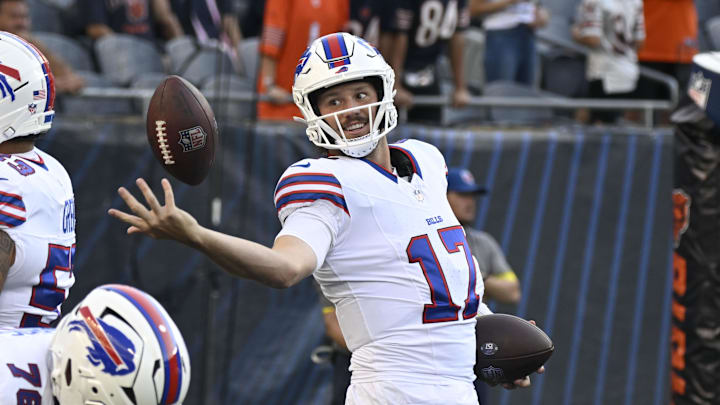 Aug 17, 2025; Chicago, Illinois, USA;  Buffalo Bills quarterback Josh Allen (17) during warmups before a preseason game against the Chicago Bears at Soldier Field.