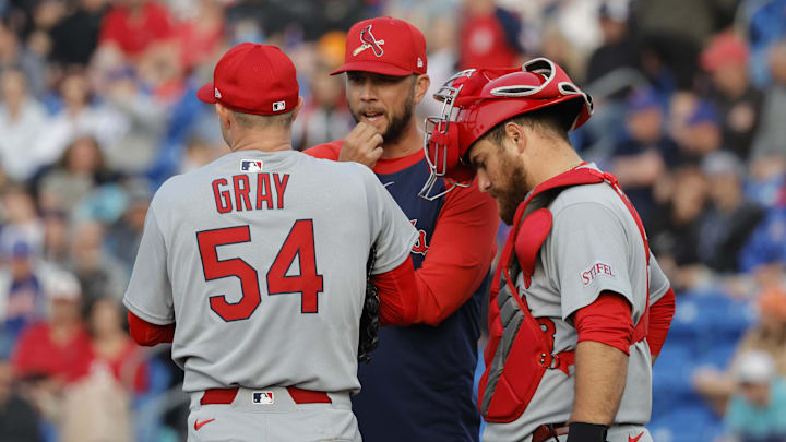 Mar 10, 2025; Port St. Lucie, Florida, USA; St. Louis Cardinals pitching coach Dusty Blake talks with pitcher Sonny Gray (54) and catcher Pedro Pagés (43) during the second inning against the New York Mets at Clover Park. Mandatory Credit: Reinhold Matay-Imagn Images Mar 10, 2025; Port St. Lucie, Florida, USA; St. Louis Cardinals pitching coach Dusty Blake talks with pitcher Sonny Gray (54) and catcher Pedro Pagés (43) during the second inning against the New York Mets at Clover Park. Mandatory Credit: Reinhold Matay-Imagn Images