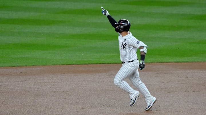 Oct 29, 2024; New York, New York, USA; New York Yankees second baseman Gleyber Torres (25) celebrates after hitting a three-run home run during the eighth inning against the Los Angeles Dodgers in game four of the 2024 MLB World Series at Yankee Stadium. Mandatory Credit: John Jones-Imagn Images Oct 29, 2024; New York, New York, USA; New York Yankees second baseman Gleyber Torres (25) celebrates after hitting a three-run home run during the eighth inning against the Los Angeles Dodgers in game four of the 2024 MLB World Series at Yankee Stadium. Mandatory Credit: John Jones-Imagn Images