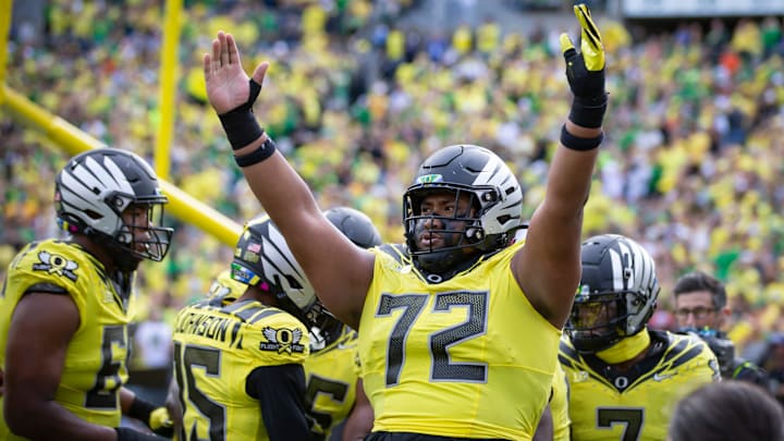 Oregon offensive lineman Iapani Laloulu celebrates a touchdown by Oregon running back Noah Whittington as the No. 1 Oregon Ducks host the No. 21 Illinois Fighting Illini Saturday, Oct. 26, 2024 at Autzen Stadium in Eugene, Ore.