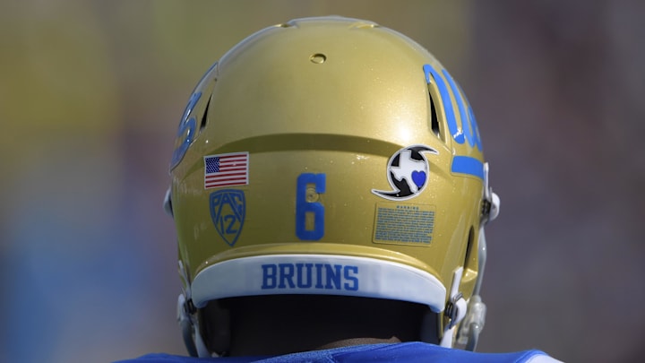Sep 3, 2017; Pasadena, CA, USA; UCLA Bruins defensive back Adarius Pickett (6) wears Hurricane Harvey sticker on helmet during a NCAA football game against the Texas A&M Aggies at Rose Bowl. The sticker features the state of Texas inside the symbol for a hurricane and a heart over where Houston is located on the state map. Mandatory Credit: Kirby Lee-Imagn Images