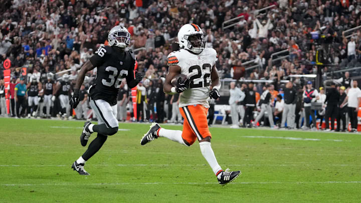 Nov 23, 2025; Paradise, Nevada, USA; Cleveland Browns running back Dylan Sampson (22) scores on a 66-yard touchdown reception against Las Vegas Raiders cornerback Kyu Blu Kelly (36) in the second half at Allegiant Stadium. Mandatory Credit: Kirby Lee-Imagn Images